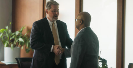 Martin A. Foos shaking the hand of a client