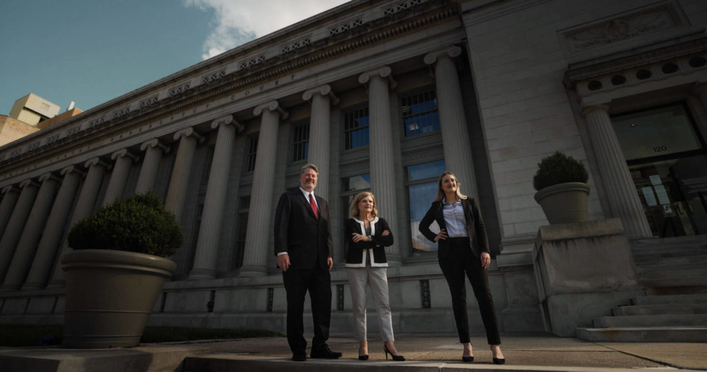 Martin A. Foos, Mary E. Lentz and Cassandra Andres Rice standing outside of Dayton courthouse